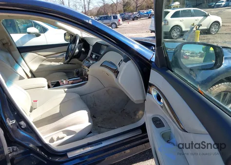 2015 Infiniti Q70 3.7 из США, поврежденный, VIN JN1BY1AP9FM541099